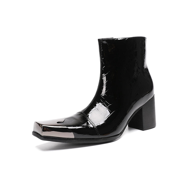 Pair of black patent crocodile embossed ankle boots with square metal toe caps and block heels, side view.