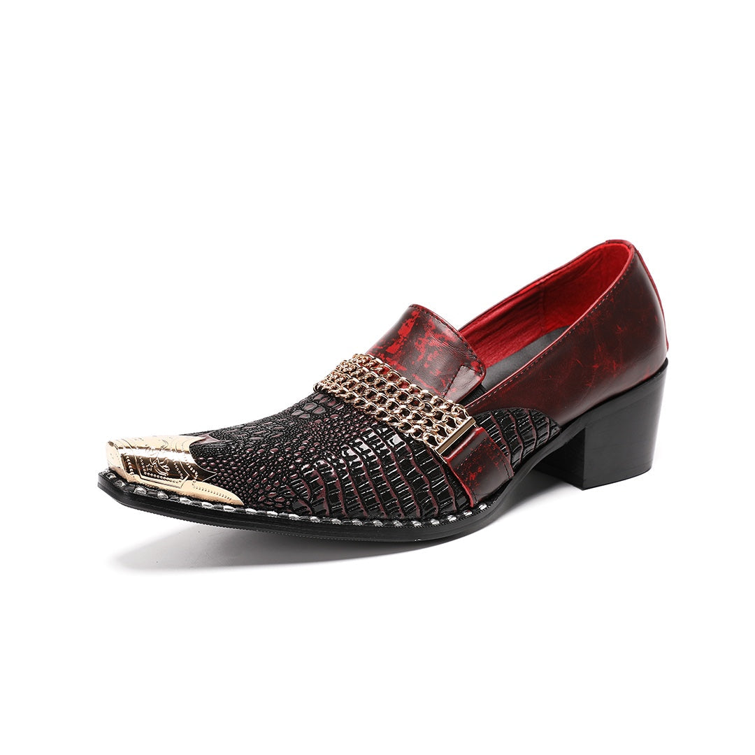 A pair of Dolashoes men's red and black textured leather loafers with gold metal toe caps and chain embellishments on a white