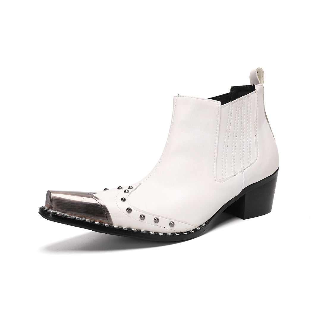 Pair of white studded Chelsea boots with silver metal toe caps and black heels on a white background.