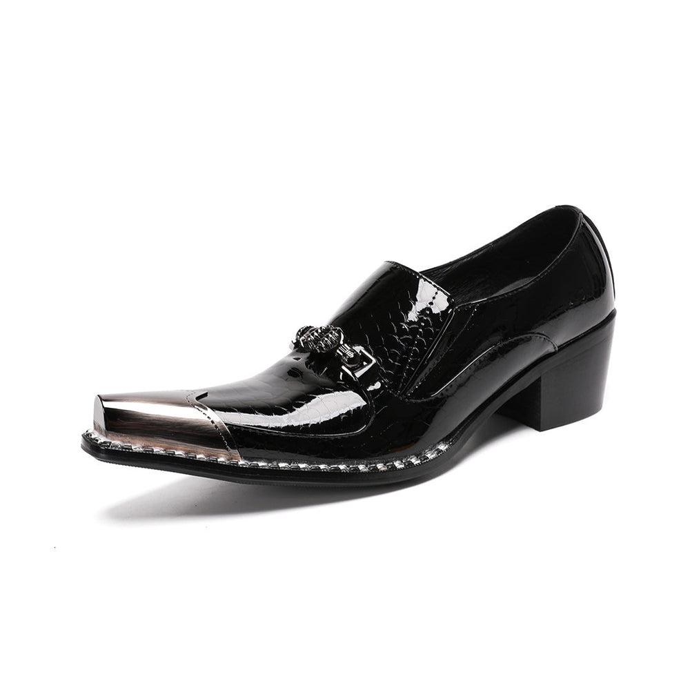 Pair of black patent leather men's loafers with silver metal cap toes and decorative buckles.