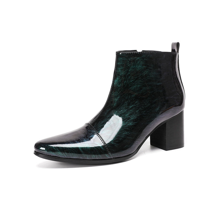 Pair of iridescent dark green patent leather pointed toe ankle boots with block heels and side zippers.