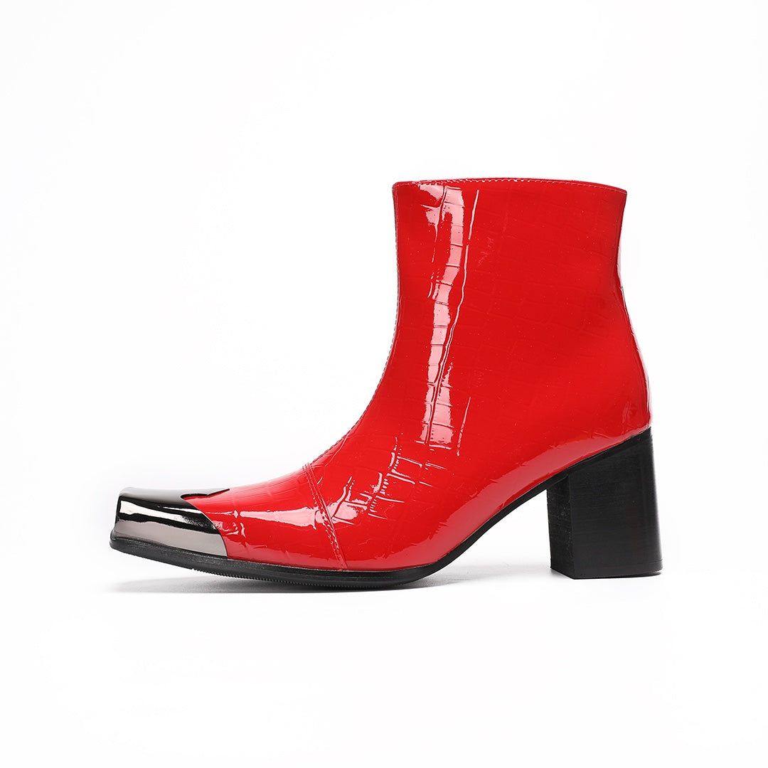 Pair of shiny red patent crocodile embossed ankle boots with square metal toe caps and black block heels.