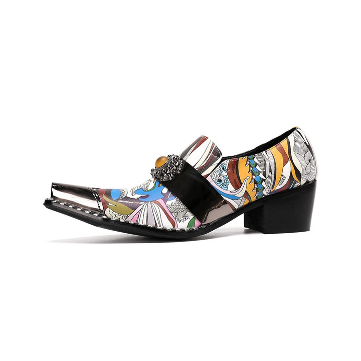 A single men's artistic patterned pointed toe shoe with a metal tip and an ornate buckle, displayed on a white background.