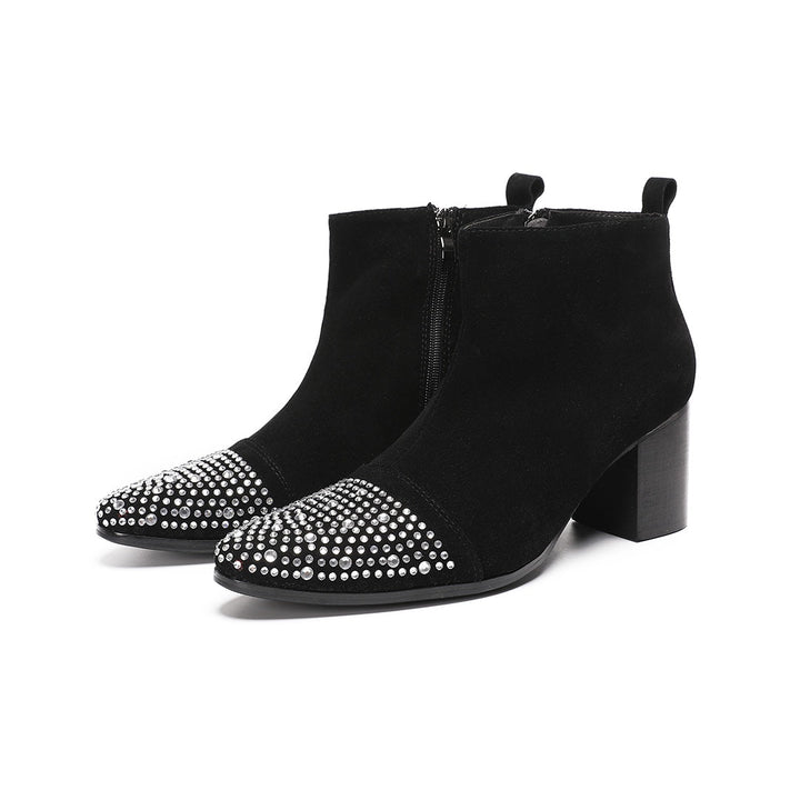 Pair of black suede ankle boots with a studded pointed toe and block heels, shown from various angles.