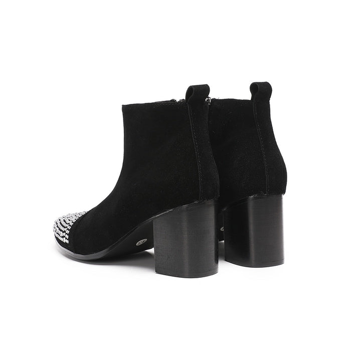 Pair of black suede ankle boots with a studded pointed toe and block heels, shown from various angles.
