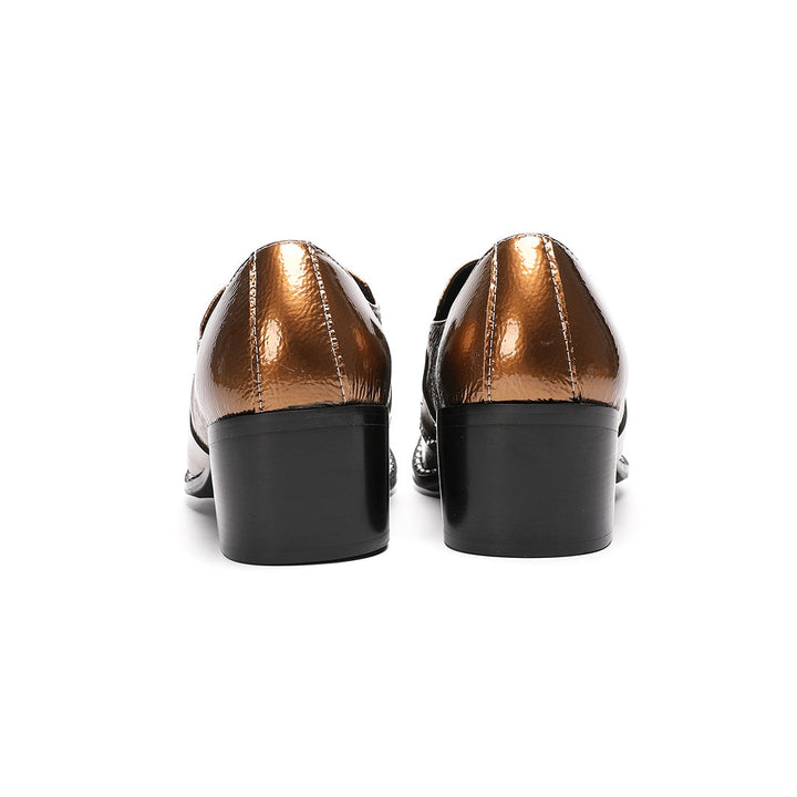 Pair of men's bronze patent leather high heel slip-on shoes with pointed metal toe caps and ornate vamp embellishments on a