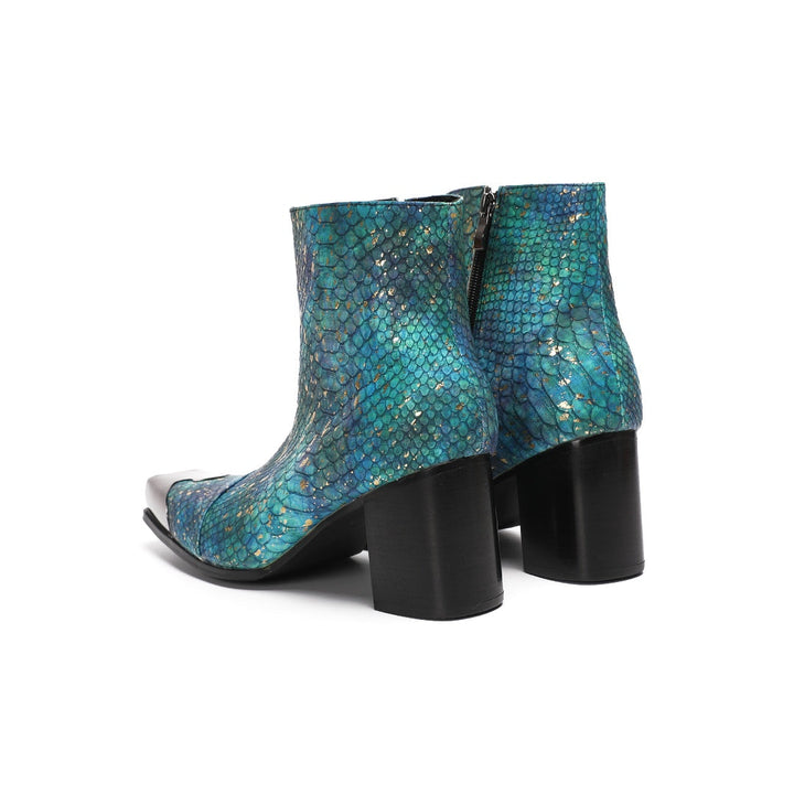 A pair of men's teal snake print ankle boots with a square metal tip and black block heel, shown on a white background.