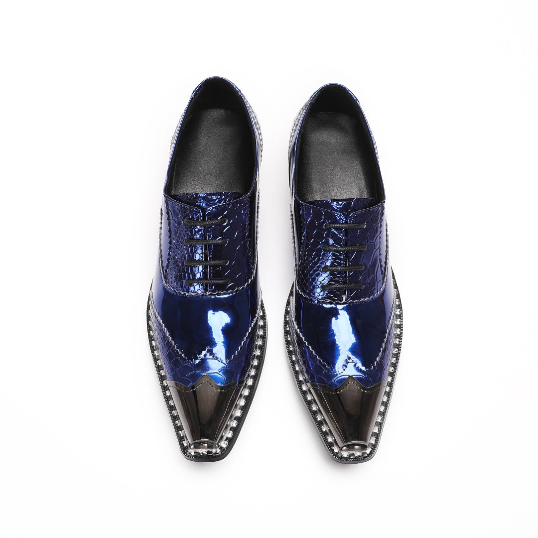 Pair of men's blue patent leather dress shoes with crocodile texture, a shiny metallic square toe, and a chunky heel, viewed