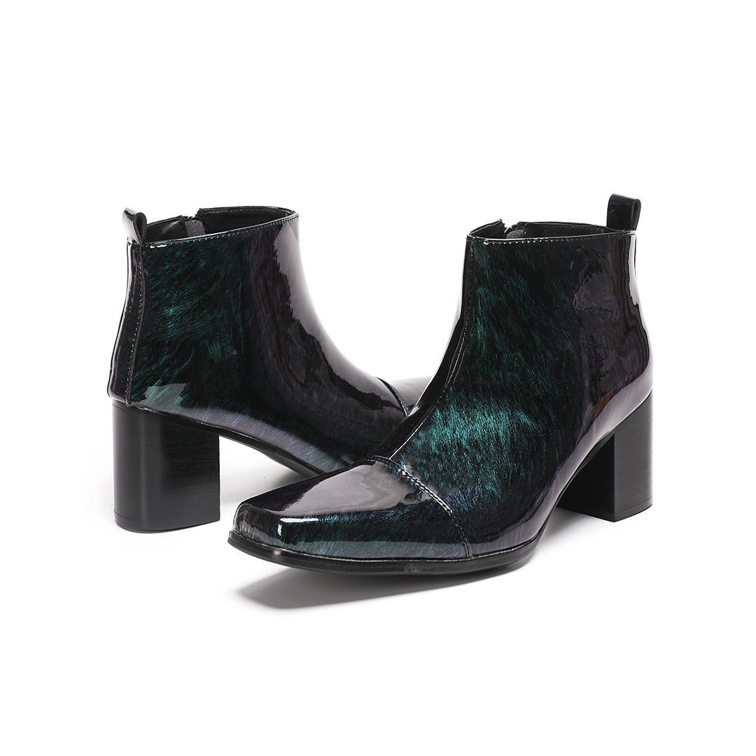 Pair of Dolashoes iridescent green-purple patent leather square toe ankle boots with block heels and side zippers, displayed