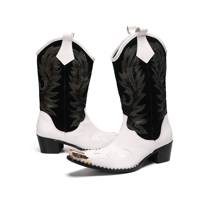 Pair of white and black embroidered cowboy boots with a gold metal tip on a white background.