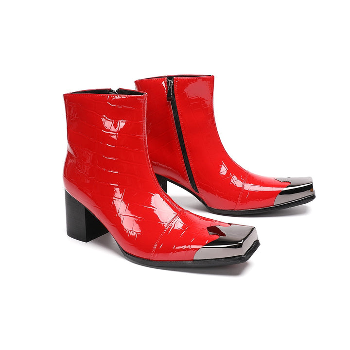Pair of shiny red patent crocodile embossed ankle boots with square metal toe caps and black block heels.