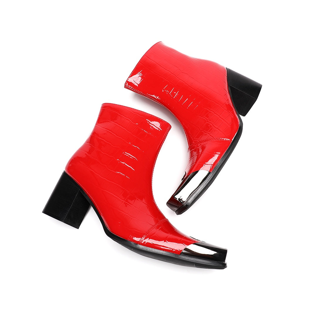 Pair of shiny red patent crocodile embossed ankle boots with square metal toe caps and black block heels.