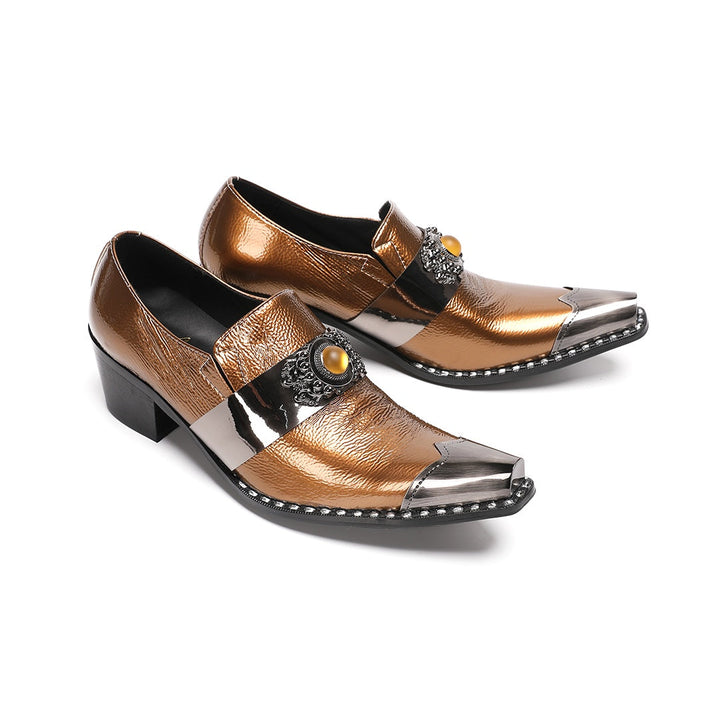 Pair of men's bronze patent leather high heel slip-on shoes with pointed metal toe caps and ornate vamp embellishments on a
