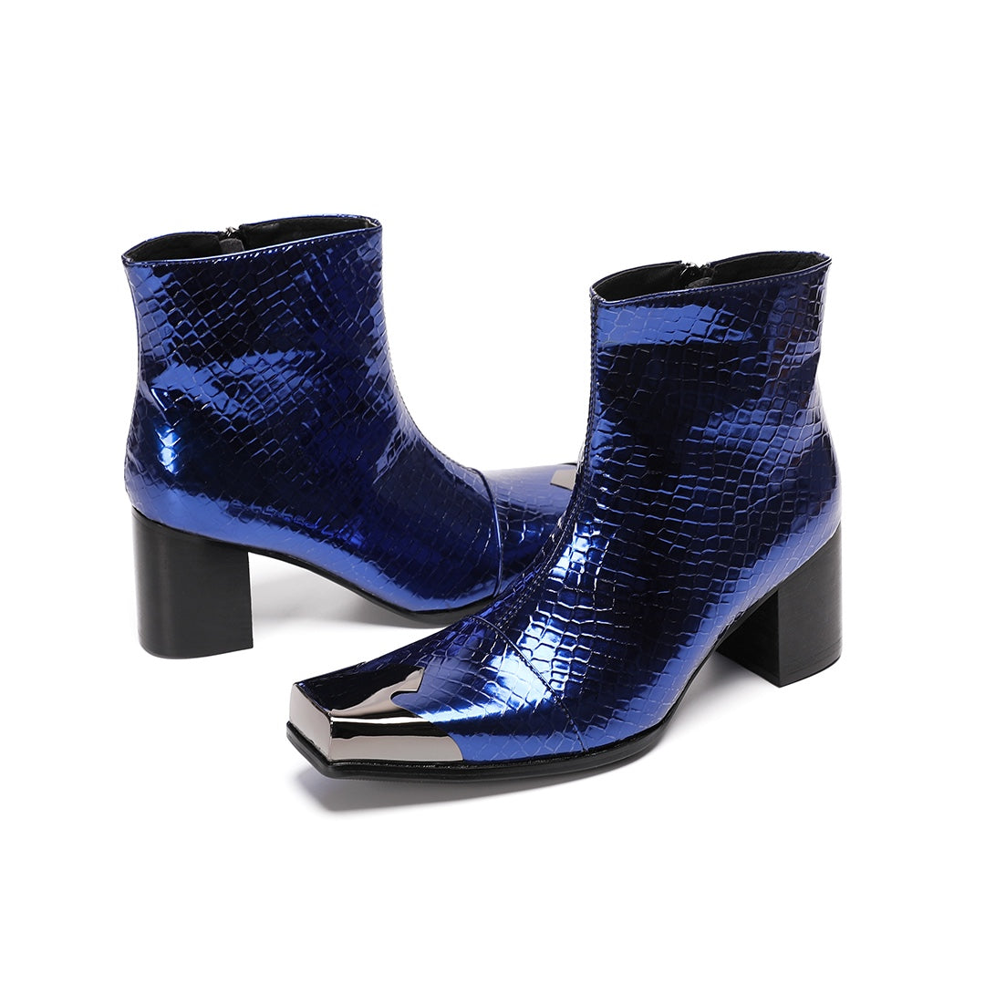Pair of men's blue patent croc-embossed ankle boots with a square metal toe cap and block heel.