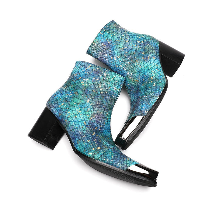 A pair of men's teal snake print ankle boots with a square metal tip and black block heel, shown on a white background.