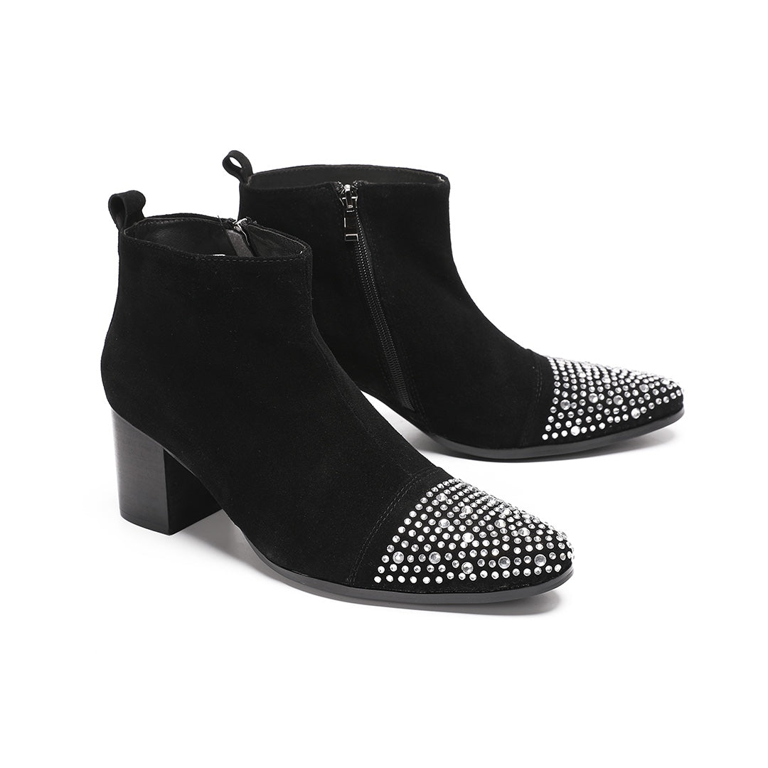 Pair of black suede ankle boots with a studded pointed toe and block heels, shown from various angles.