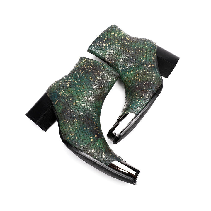 Pair of green and gold snake print ankle boots with a square metal toe cap and block heel.