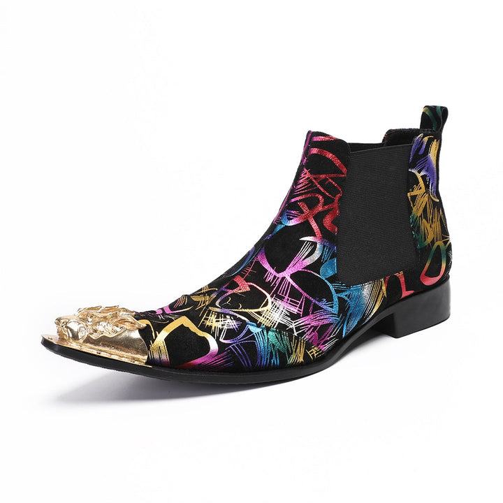 Pair of men's black Chelsea boots with a vibrant multi-color graffiti pattern and a gold metal pointed toe cap, shown from