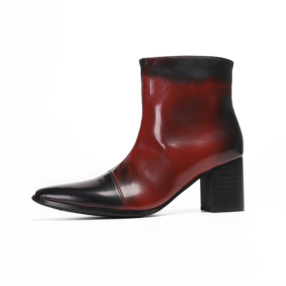 Pair of men's burnished red and black pointed toe ankle boots with a side zipper and sturdy block heel.