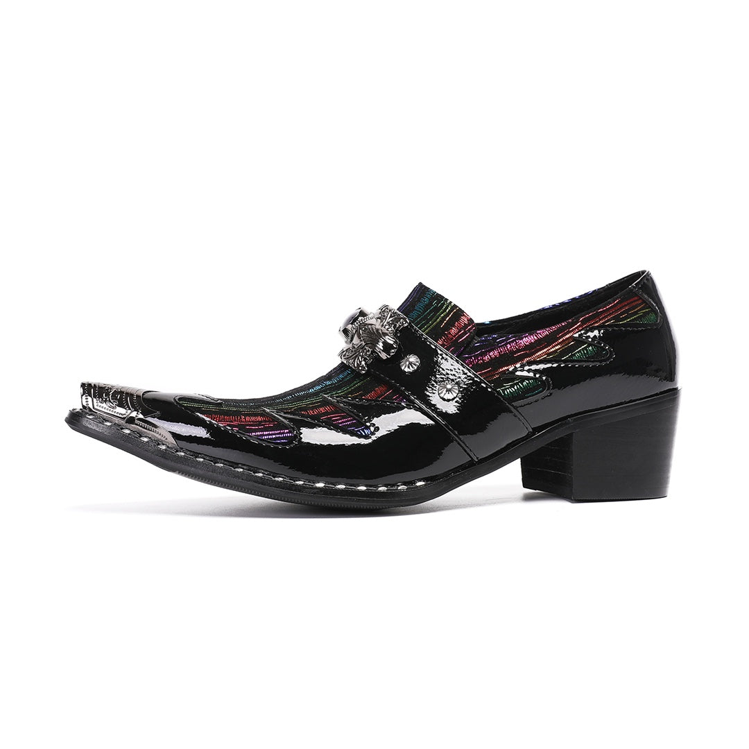 A single black patent leather men's dress shoe with a pointed metal toe, rainbow-striped vamp, and a decorative silver buckle