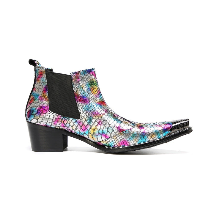 A pair of multi-color iridescent snakeskin Chelsea ankle boots with pointed metal toe caps and black block heels.