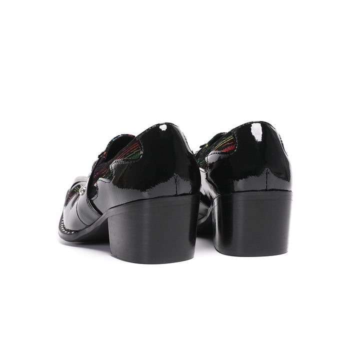 A single black patent leather men's dress shoe with a pointed metal toe, rainbow-striped vamp, and a decorative silver buckle