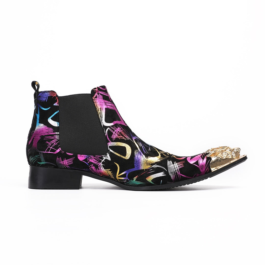 Pair of men's black Chelsea boots with a vibrant multi-color graffiti pattern and a gold metal pointed toe cap, shown from
