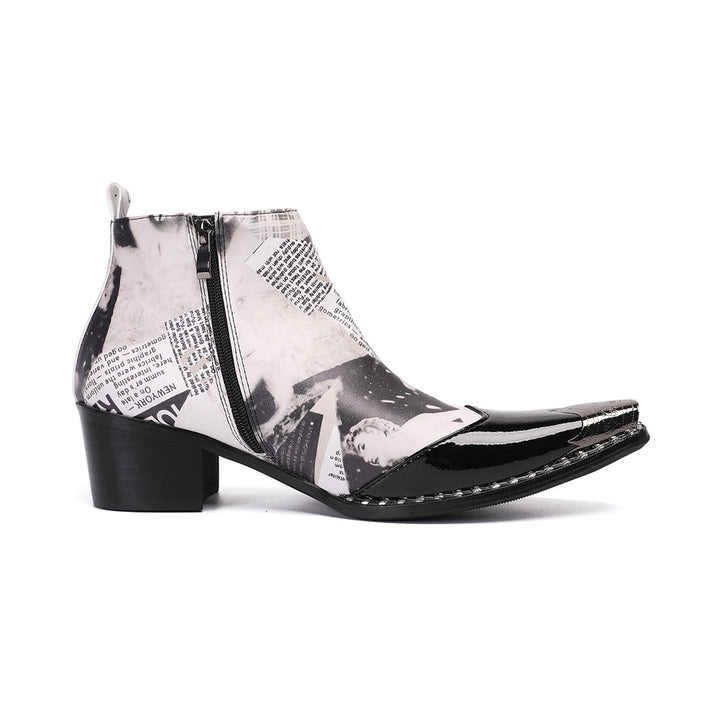 Pair of men's black and white newspaper print ankle boots with pointed patent leather toe and metal tip, side zipper, and