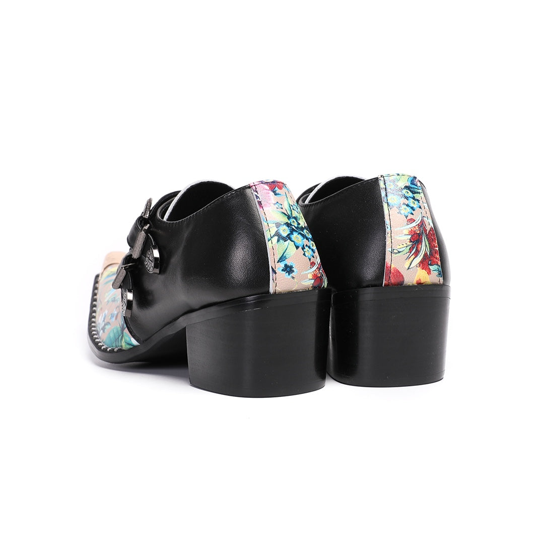 Pair of men's black and floral print buckle dress shoes with a gold metal pointed toe.
