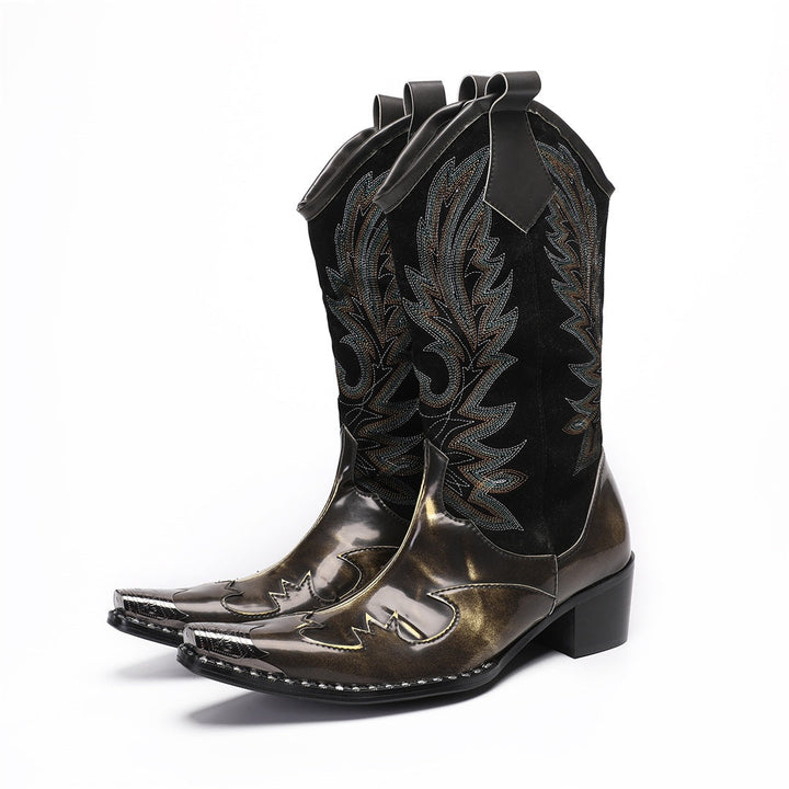 Pair of men's black and metallic bronze cowboy boots with intricate embroidery and a sharp pointed toe, shown against a white