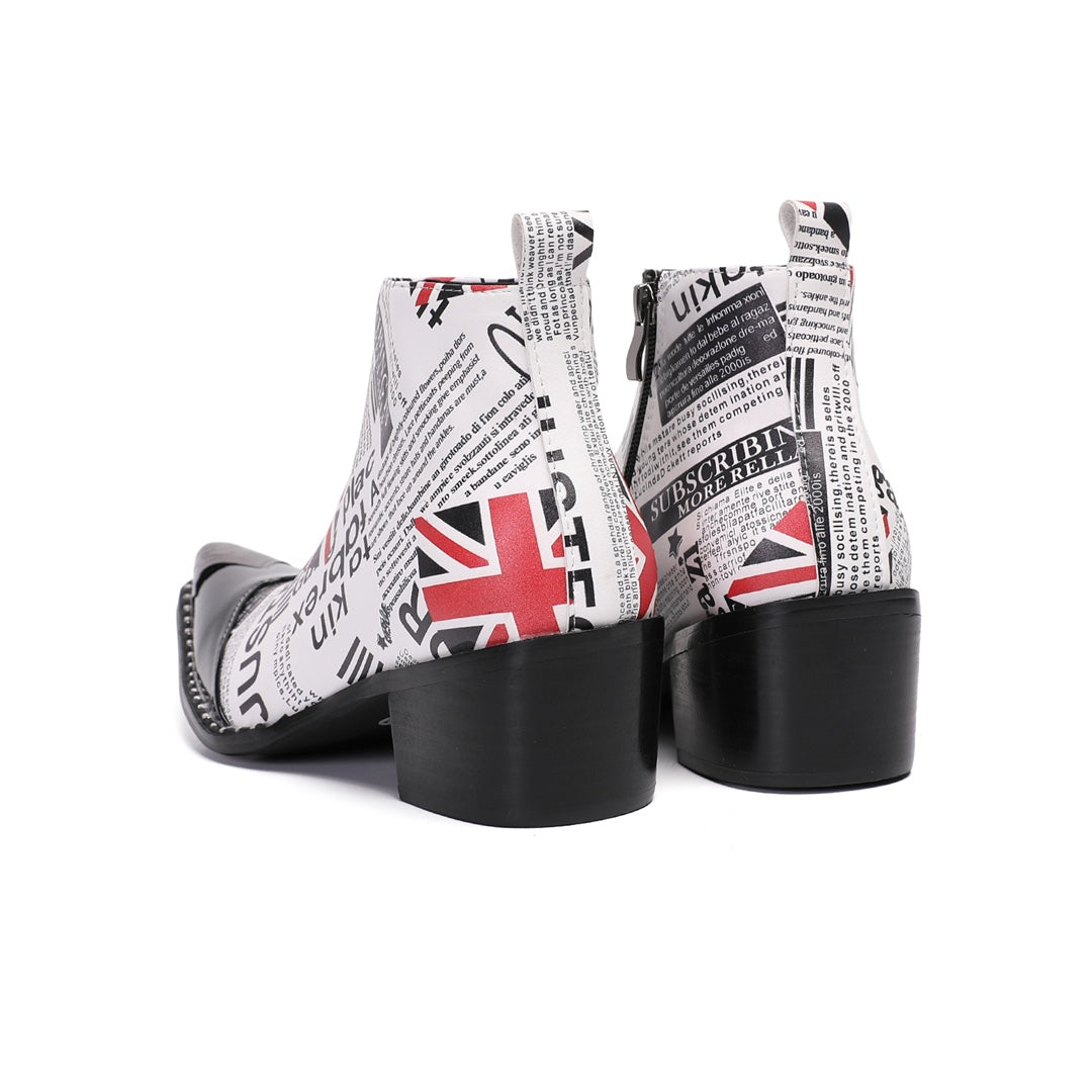 Men's white ankle boots with black newspaper print, red Union Jack flags, a sharp pointed toe with a black patent leather
