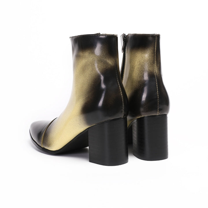 Pair of men's gradient ankle boots with a black to gold finish, pointed toe, and block heel, shown from various angles.