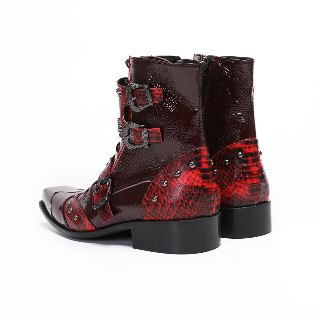 A pair of men's red studded ankle boots with snake print and metal toe cap, shown against a white background.