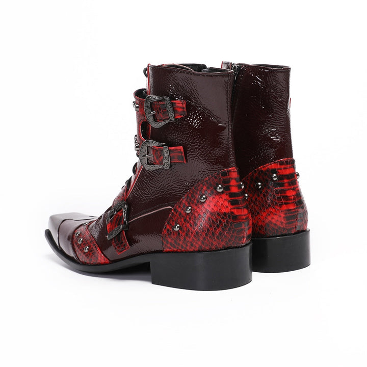 A pair of men's red studded ankle boots with snake print and metal toe cap, shown against a white background.