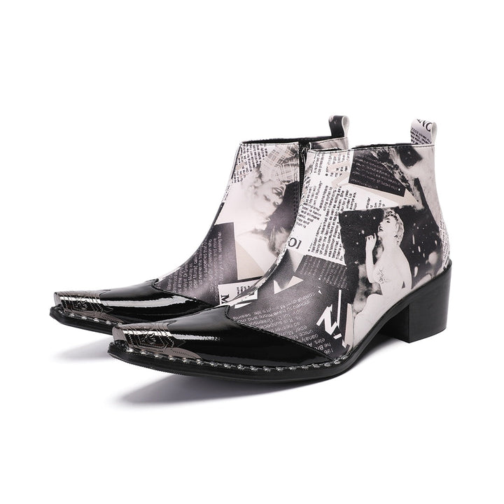 Pair of men's black and white newspaper print ankle boots with pointed patent leather toe and metal tip, side zipper, and
