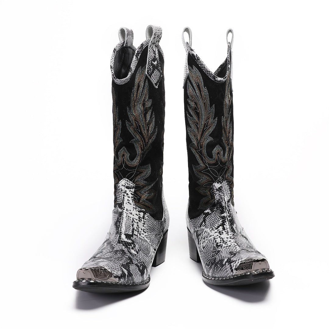 A pair of black and white snakeskin cowboy boots with an embroidered shaft and metal-tipped pointed toe.