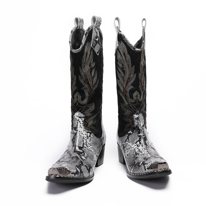 A pair of black and white snakeskin cowboy boots with an embroidered shaft and metal-tipped pointed toe.