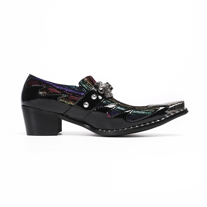 A single black patent leather men's dress shoe with a pointed metal toe, rainbow-striped vamp, and a decorative silver buckle