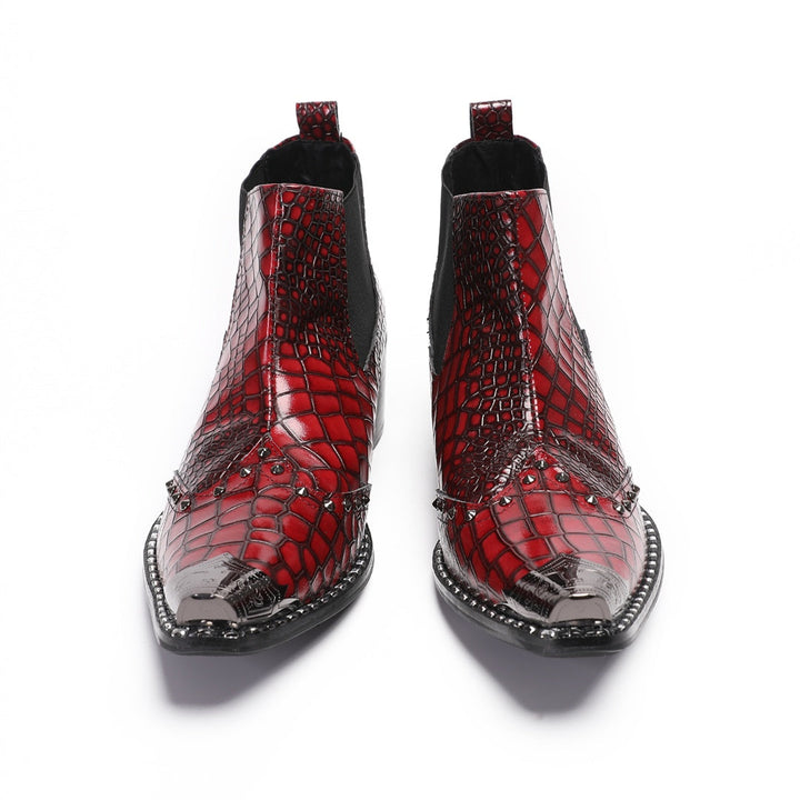 Pair of men's red crocodile embossed Chelsea boots with pointed metal toe caps and studs
