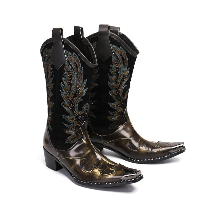 Pair of men's black and metallic bronze cowboy boots with intricate embroidery and a sharp pointed toe, shown against a white