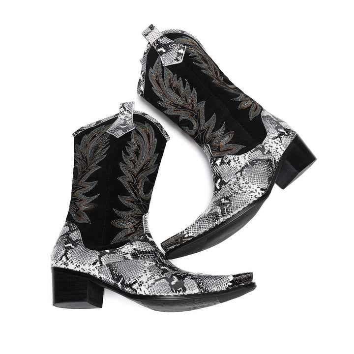 A pair of black and white snakeskin cowboy boots with an embroidered shaft and metal-tipped pointed toe.
