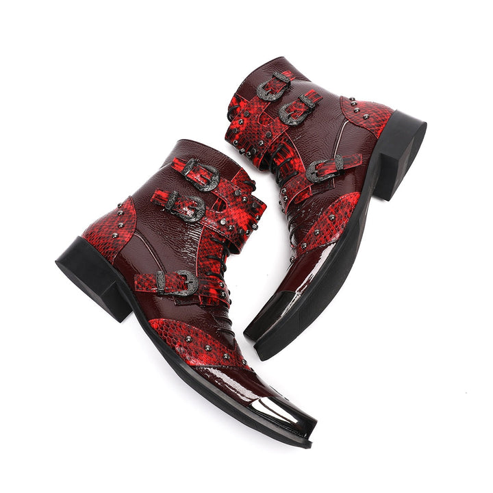 A pair of men's red studded ankle boots with snake print and metal toe cap, shown against a white background.