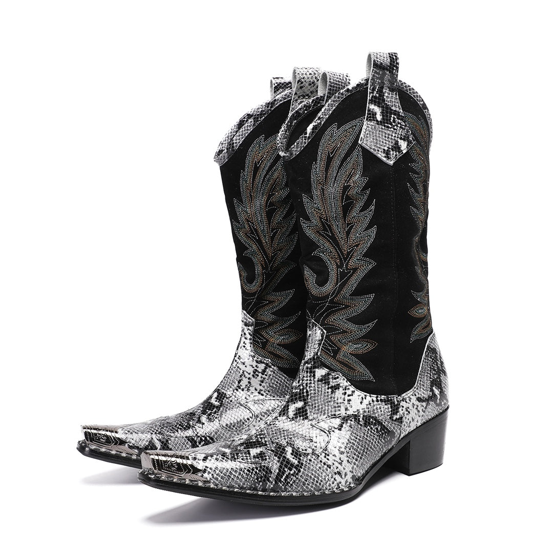 A pair of black and white snakeskin cowboy boots with an embroidered shaft and metal-tipped pointed toe.