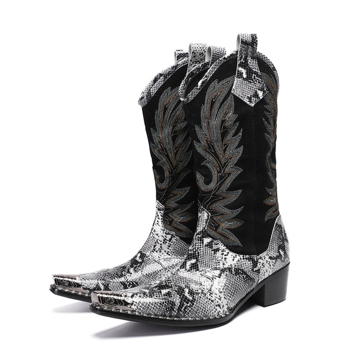 A pair of black and white snakeskin cowboy boots with an embroidered shaft and metal-tipped pointed toe.
