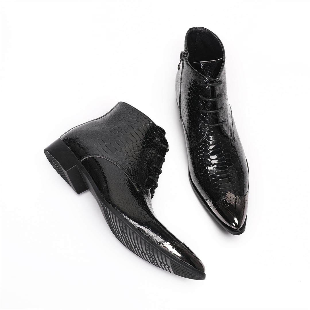 Pair of men's black snakeskin embossed ankle boots with a shiny metal pointed toe cap, lace-up front, and side zipper.
