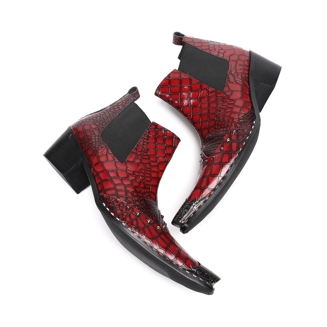Pair of men's red crocodile embossed Chelsea boots with pointed metal toe caps and studs